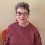 A person wearing glasses

Description automatically generated with medium confidence