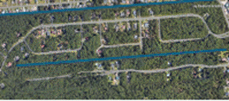 A aerial view of a neighborhood

Description automatically generated