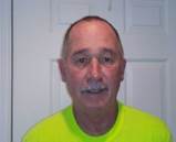 A person in a yellow shirt

Description automatically generated